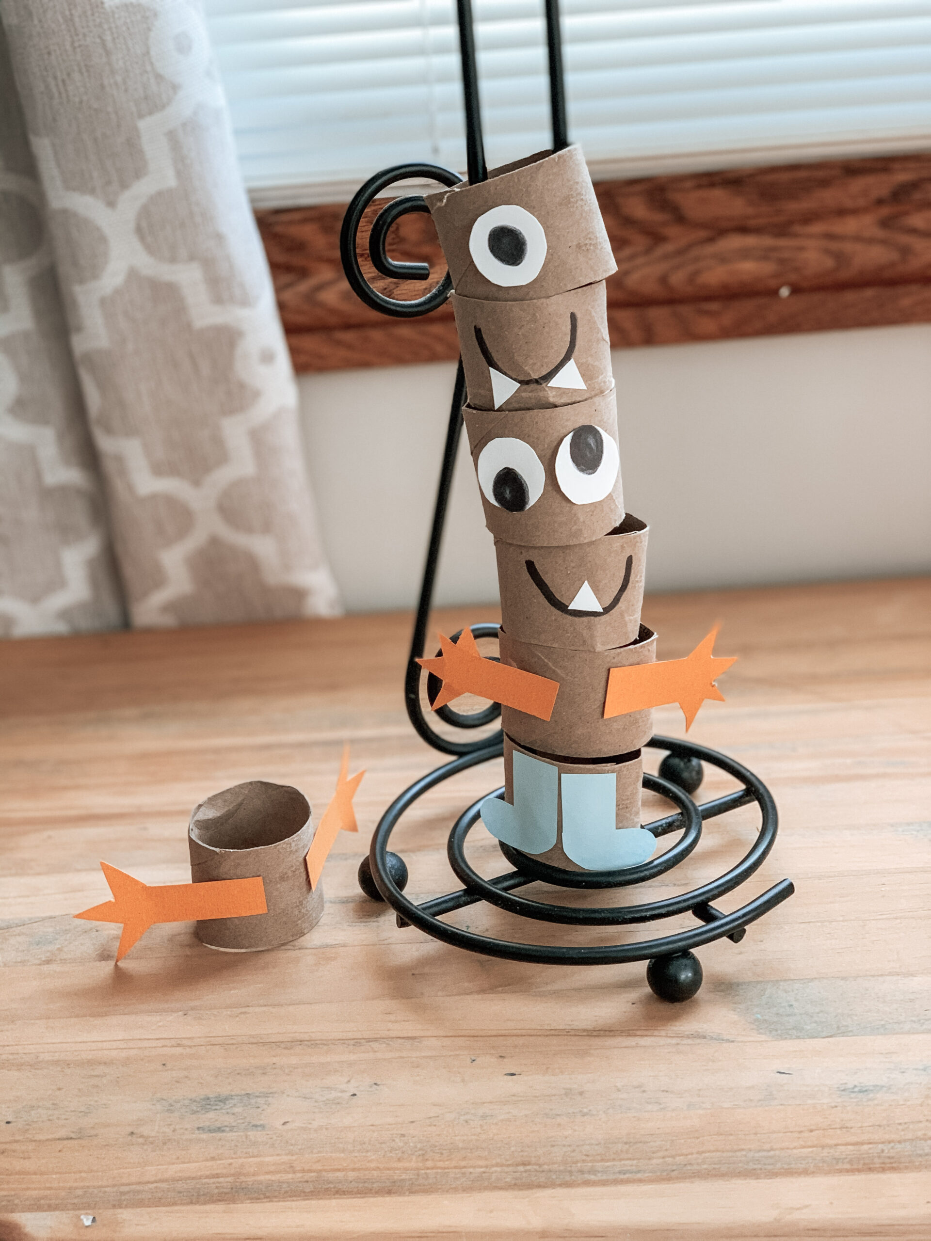 Completed repurposed monster craft using toilet paper rolls and ready for kid's to play with