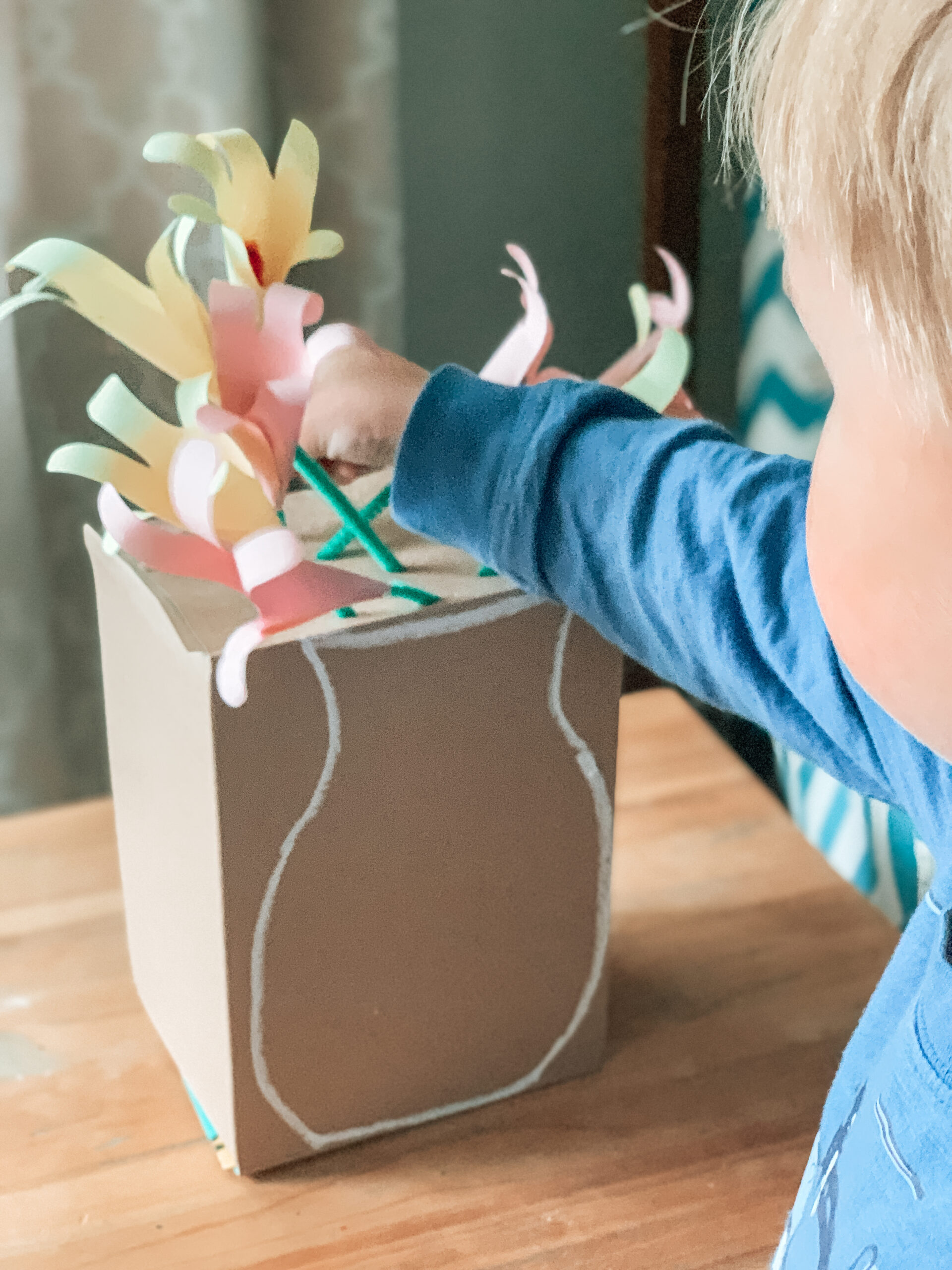 handprint flower arranging activity for kids